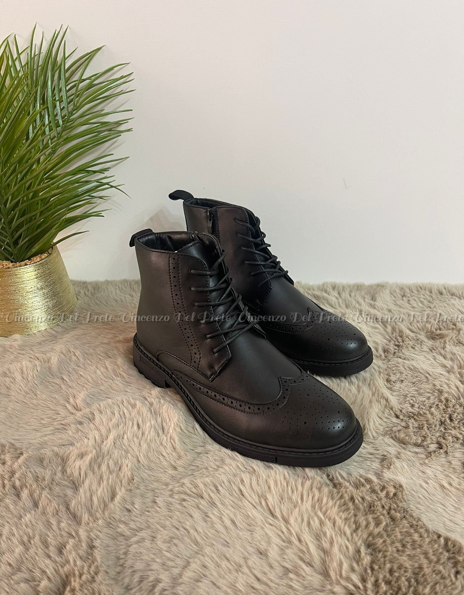 STIVALETTO IN PELLE CON LACCI E ZIP SUOLA IN GOMMA