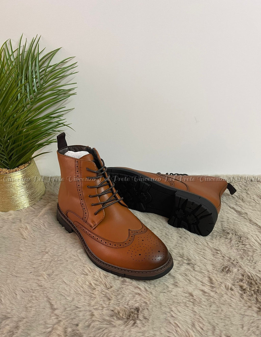 STIVALETTO IN PELLE CON LACCI E ZIP SUOLA IN GOMMA