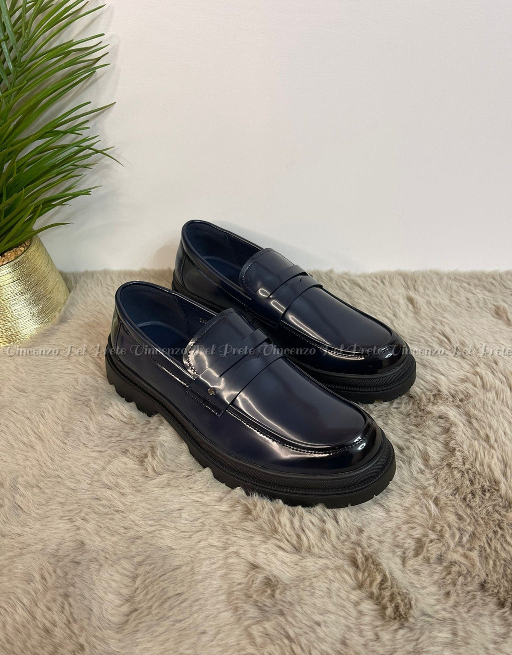 MOCASSINI SENZA LACCI IN PELLE CON SUOLA IN GOMMA