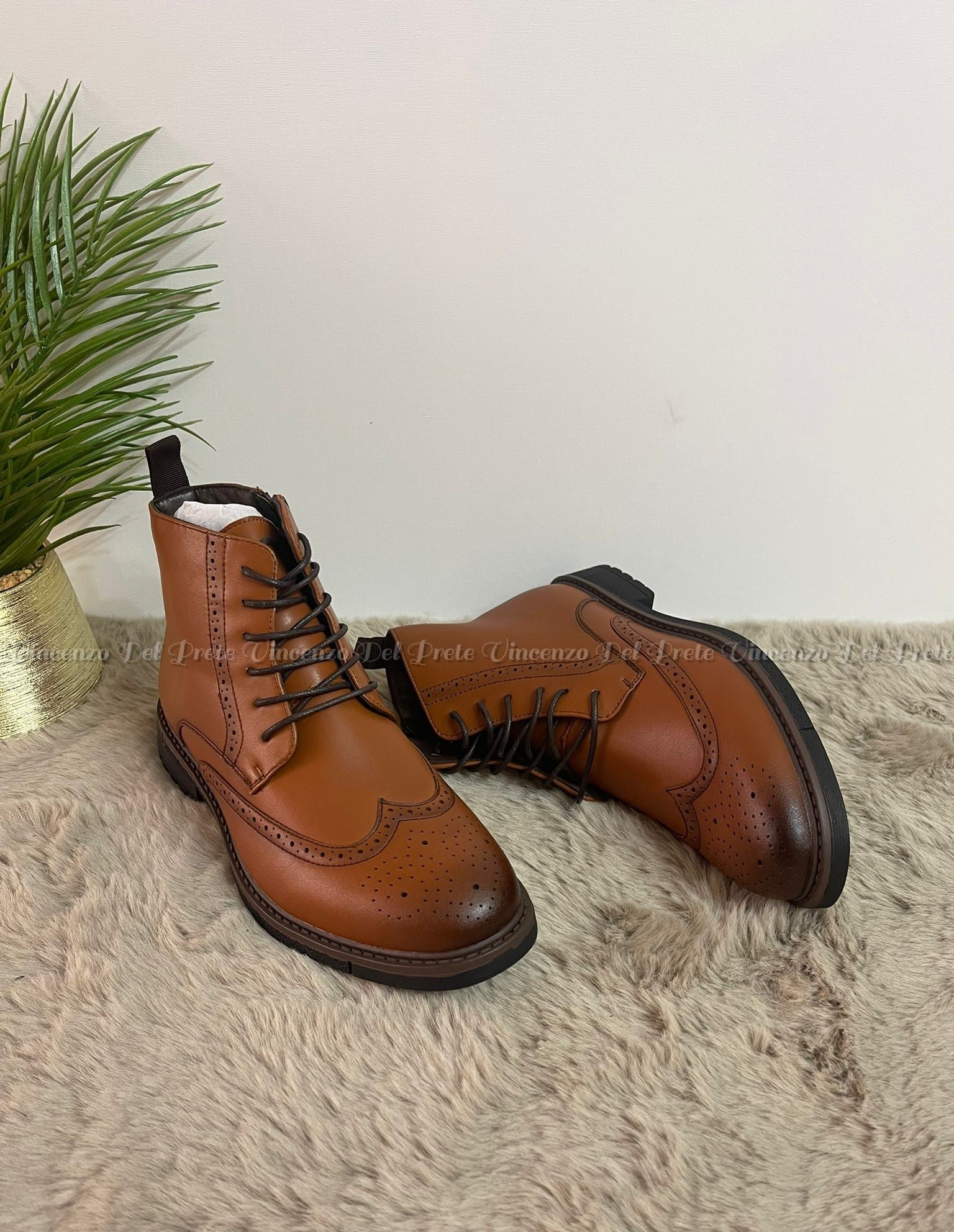 STIVALETTO IN PELLE CON LACCI E ZIP SUOLA IN GOMMA